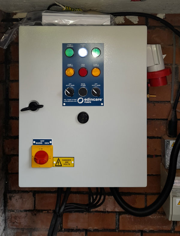 The control panel features a battery-backup for the high level alarm and a generator port.